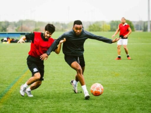 Semi-professional soccer player leagues, or semi-pro leagues, are essential to the soccer landscape in many communities across the United States. These leagues allow players to play at a higher level than amateur leagues while still allowing them to maintain their other commitments, such as work or school.
This article aims to provide readers with a comprehensive understanding of what semi-pro soccer player leagues are and how they operate. We will explore the benefits of joining a semi-pro league, the challenges these leagues face, and their potential for growth and success in the future.
Whether you're a dedicated soccer player looking to take your game to the next level or a fan interested in learning more about the sport, this article will provide valuable insights into the world of semi-pro soccer player leagues.
Definition of a Semi-Pro Soccer Player League
A semi-pro soccer player league is a competitive league for players who still need to become professional but have a higher skill level than those in amateur leagues. These leagues typically pay their players in some capacity, but more than the compensation is needed to support them fully.
Compared to amateur leagues, semi-pro leagues allow players to play at a higher level with more experienced and skilled opponents. Semi-pro leagues also tend to have more structured schedules, with regular training sessions and games.
Semi-pro leagues are important in promoting soccer in communities as they provide an outlet for players who want to continue playing competitively outside college or high school teams. These leagues often serve as a stepping stone for players who aspire to play professionally, providing opportunities for exposure to scouts and professional teams. Additionally, semi-pro leagues can bring together people from different backgrounds and cultures, promoting diversity and unity within local communities.
The Benefits of Joining a Semi-Pro Soccer Player League
There are several benefits to joining a semi-pro soccer player league:
Playing at a higher level: Semi-pro leagues allow players to compete against more skilled opponents, which can help improve their game and develop new playing strategies.
Increased exposure: Players in semi-pro leagues often have opportunities to showcase their skills in front of scouts and professional teams, increasing their chances of being recruited to play professionally.
Developing connections: Joining a semi-pro league allows players to connect with others with similar interests and aspirations, potentially leading to new friendships and networking opportunities.
Improving fitness: Semi-pro leagues typically have structured training sessions, which can help players improve their fitness levels and overall health.
Greater sense of fulfillment: For players who have a passion for soccer, joining a semi-pro league can be a fulfilling experience that allows them to continue pursuing their dreams beyond the amateur level.
Overall, joining a semi-pro soccer player league is a valuable experience for those looking to take their game to the next level or pursue a career in professional soccer.
How to Join a Semi-Pro Soccer Player League
If you're interested in joining a semi-pro soccer player league, here are some steps you can take:
Research local leagues: Look for semi-pro soccer player leagues in your area and research each to find out which would best fit you.
Contact the league: Reach out to the league's organizers or coaches to inquire about tryouts and requirements for joining.
Attend a tryout: Most semi-pro leagues require players to attend a tryout to showcase their skills. Make sure to come fully prepared, wear appropriate gear, and bring plenty of water.
Meet the requirements: Depending on the league, certain requirements may be met to join, such as age restrictions or residency requirements. Make sure to meet all of these qualifications before trying out.
Stay committed: Once you've joined a semi-pro league, stay committed to attending practices and games, and continue to work hard to improve your skills.
Here are some tips to help you prepare for tryouts:
Practice regularly: Dedicate time to practicing your soccer skills through drills or playing pickup games with friends.
Stay in shape: Make sure to maintain a good level of physical fitness by staying active outside of soccer, such as through cardiovascular exercise or weight training.
Build mental toughness: Playing in a semi-pro league can be mentally challenging, so work on building mental toughness through meditation or visualization techniques.
Be coachable: Coaches are looking for players who are receptive to feedback and willing to learn, so demonstrate your coachability during tryouts.
Following these steps and preparing well for tryouts can increase your chances of successfully joining a semi-pro soccer player league.
How Semi-Pro Soccer Player Leagues Operate
Semi-pro soccer player leagues operate similarly to professional leagues, with some key differences. Here's an overview of how semi-pro leagues are structured:
Teams: Semi-pro leagues consist of multiple teams, each with a roster of players.
Schedule: The league schedule includes regular season games, playoffs, and championships.
Rules and regulations: Each league has its own rules and regulations governing player eligibility, gameplay, and other aspects of the league.
Compensation: Players in semi-pro leagues are typically paid, although the amount varies widely depending on the league and team.
Tournaments and competitions: Besides regular season games, semi-pro leagues may offer tournaments and other competitions.
Here are some more detailed explanations of these aspects of semi-pro soccer player leagues:
League structure: Semi-pro soccer player leagues are typically organized into divisions or conferences based on geography or level of play. Teams within each division or conference compete against one another throughout the season, with the top teams advancing to the playoffs and championships.
Rules and regulations: Each league has its own rules and regulations regarding player eligibility, gameplay, and other aspects of the league. These rules are designed to ensure fair play and safety for all participants.
Types of competitions and tournaments: Besides regular season games, semi-pro leagues may offer various tournaments and competitions throughout the season. These can include single-elimination tournaments, round-robin tournaments, or other formats.
Overall, semi-pro soccer player leagues offer a competitive and exciting environment for players who want to continue playing at a high level outside of college or professional soccer. Understanding how these leagues operate can help players better prepare for tryouts and get the most out of their experience in the league.
Challenges Faced by Semi-Pro Soccer Player Leagues
While semi-pro soccer player leagues can offer many benefits, they also face several challenges. Here are some common challenges faced by semi-pro leagues:
Lack of funding and sponsorship: Semi-pro leagues often need help to secure enough funding and sponsorships to cover the league's costs. This can lead to financial instability and make it difficult to offer competitive salaries or prizes for players.
Difficulty in attracting and retaining talented players: Semi-pro leagues may need help to attract top talent due to the lower pay and lack of recognition compared to professional leagues. Additionally, talented players may leave the league if they receive professional offers.
Limited media coverage: Semi-pro leagues often need more media coverage, making it difficult to attract fans and generate excitement around the league.
Distance and travel: Semi-pro leagues may cover a wide geographic area, making it challenging for teams to travel long distances to compete in games.
Competition from other leagues: Semi-pro leagues may face competition from other amateur or semi-pro leagues and professional leagues at higher levels.
These challenges can make it difficult for semi-pro soccer player leagues to succeed and thrive. However, with dedication and support from their communities, many leagues can overcome these challenges and continue offering opportunities for local players to compete at a high level.
The Future of Semi-Pro Soccer Player Leagues
Despite the challenges that semi-pro soccer player leagues face, there are also several potential growth opportunities for these leagues. Here are some key factors to consider:
The growing interest in soccer: Soccer is becoming increasingly popular in the United States, which could lead to more interest in semi-pro and professional soccer player leagues.
Expansion of professional leagues: As professional soccer leagues continue to expand; they may create opportunities for semi-pro players to join or be scouted by professional teams.
Community support: Strong support from local communities can be a key factor in the success of semi-pro leagues. By promoting and attending games, fans can help generate excitement around the league and attract new players and sponsors.
Technology and media coverage: Advances in technology and media can help semi-pro leagues increase their visibility and reach a wider audience through live streaming, social media, and other platforms.
In recent years, there have been several major developments in semi-pro soccer player leagues, including:
The establishment of new leagues: Several new semi-pro soccer player leagues have been established in recent years, offering additional opportunities for players to compete at a high level.
Increased recognition: Some semi-pro leagues have received increased recognition and media coverage, helping to raise awareness about the league and attract new fans and sponsors.
Partnerships with professional teams: Several semi-pro leagues have established partnerships with professional soccer teams, providing opportunities for players to be scouted by professional teams and move up to the professional level.
Overall, while there are still challenges facing semi-pro soccer player leagues, there are also many reasons to believe these leagues have a bright future. With the right support and resources, they can continue providing valuable opportunities for players passionate about the sport.
Success Stories from Semi-Pro Soccer Player Leagues
There have been many success stories in semi-pro soccer player leagues, with several players and teams achieving great accomplishments on and off the field. Here are some profiles of successful players who got their start in semi-pro leagues:
Jermaine Jones: Jones played for several semi-pro leagues in the United States before being signed to play professionally in Germany. He represented the United States national team in multiple World Cup tournaments.
Tony Sanneh: Sanneh played in semi-pro leagues while attending college and later played professionally, including a stint with Major League Soccer's D.C. United. He also started a foundation to promote soccer in underserved communities.
Chad Marshall: Marshall played in a semi-pro league while attending college and was later signed by the Columbus Crew of Major League Soccer, where he became one of the league's top defenders.
In addition to these individual success stories, there have also been several semi-pro teams that have achieved success on and off the field. Here are some examples:
Detroit City FC: This semi-pro team has developed a strong following in its local community, regularly drawing thousands of fans to its games. The team has also been successful on the field, winning multiple league championships.
Chattanooga FC: Another popular semi-pro team, Chattanooga FC, has won numerous league titles and has been recognized for its commitment to promoting soccer in its community.
New York Cosmos B: Part of the legendary New York Cosmos franchise, the Cosmos B team has been successful both on and off the field, attracting large crowds to its games and regularly competing for league championships.
These success stories demonstrate the potential for semi-pro soccer player leagues to provide valuable opportunities for players to develop their skills and achieve success at higher levels of play.
Conclusion
In conclusion, semi-pro soccer player leagues provide a valuable opportunity for players to continue playing at a high level and pursue a career in professional soccer. By offering competitive games, structured training sessions, and exposure to scouts and professional teams, these leagues can help players hone their skills and reach their full potential.
While there are challenges facing semi-pro leagues, such as lack of funding and competition from other leagues, there are also many potential growth opportunities for the future. With strong community support, technological advancements, and the expansion of professional leagues, semi-pro soccer player leagues can continue to flourish and offer valuable opportunities for players and fans alike.
As soccer continues to gain popularity in the United States, fans need to support local semi-pro teams by attending games, promoting the league on social media, and encouraging others to get involved. We can help ensure a bright future for soccer players and fans nationwide by working together to support these leagues.