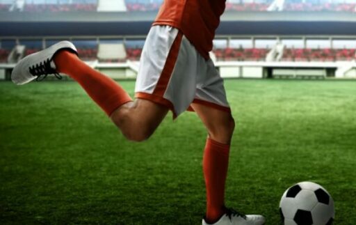 how to kick a soccer ball far